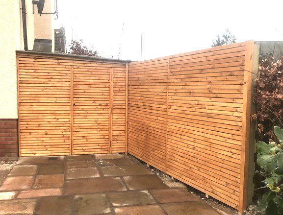 Hidden Shed using Pine Batton fencing with a cedar stain Hidden Shed using Pine Batton fencing with a cedar stain