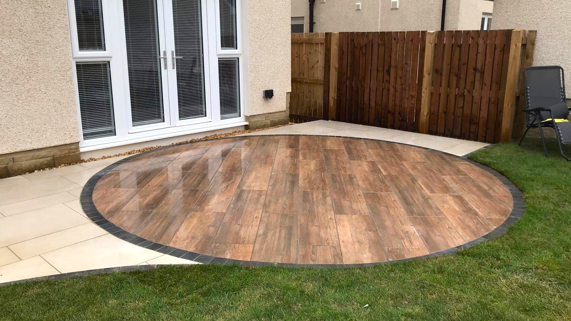 Porcalein Patio Barley with Charcoal Pocalain edging and Wood Effect Porcalain Planks Porcalein Patio Barley with Charcoal Pocalain edging and Wood Effect Porcalain Planks