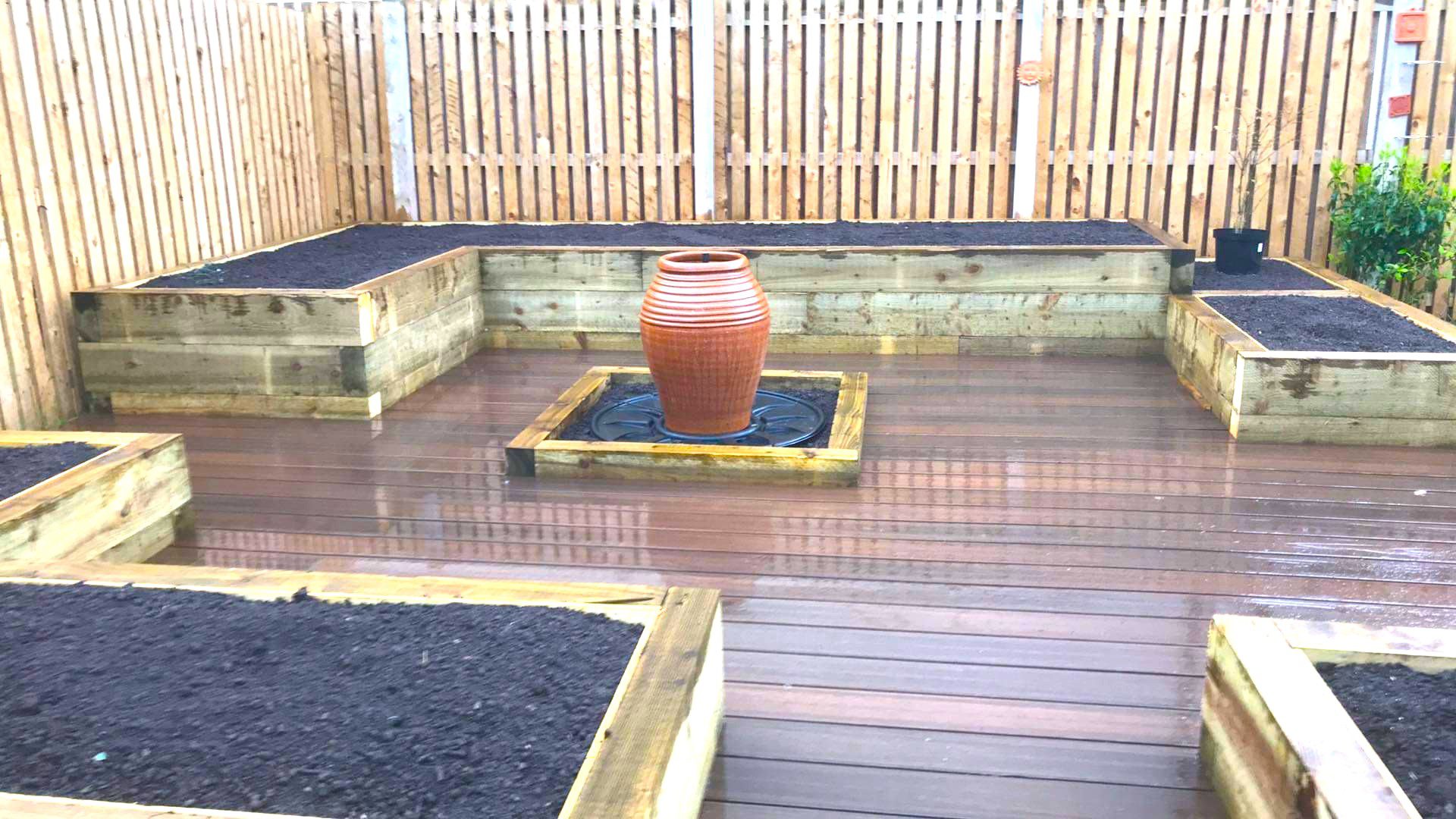 Raised bed with composit decking and water feature 1 4