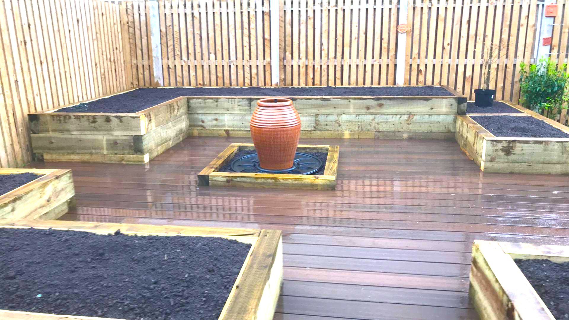 Raised bed with composit decking and water feature 1 4 Raised bed with composit decking and water feature 1 4