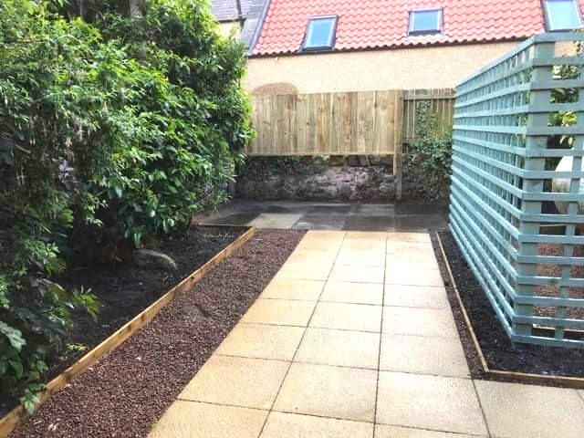 Trellis hiding tank buff textured slabs and pea gravel 1 6 Trellis hiding tank buff textured slabs and pea gravel 1 6